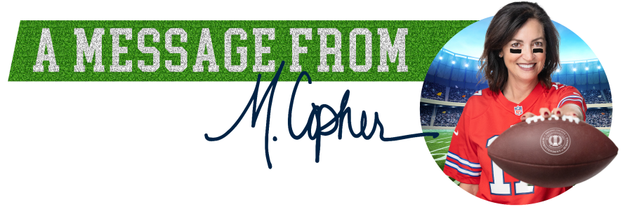 Dr. Michele Cantwell-Copher holds a football out in front of her while wearing a Josh Allen jersey.