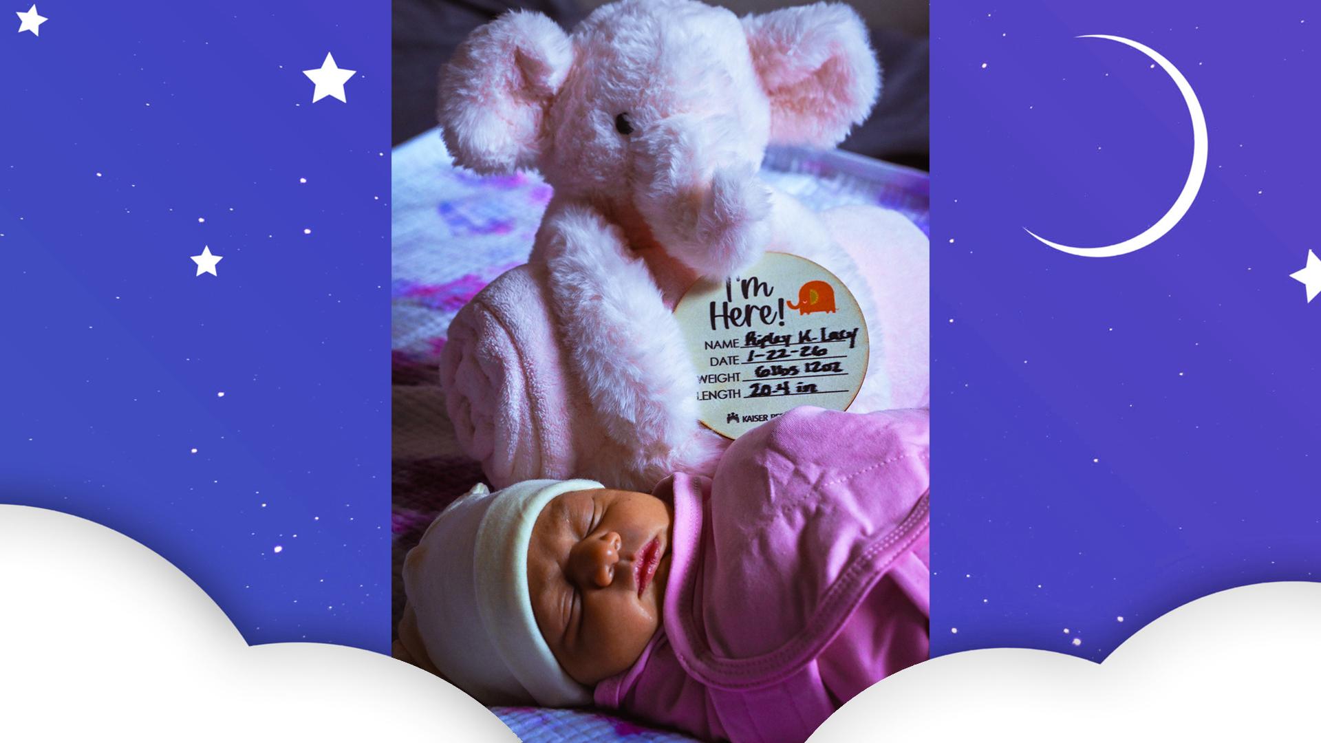 The baby is wrapped in a blanket with a hat on. 