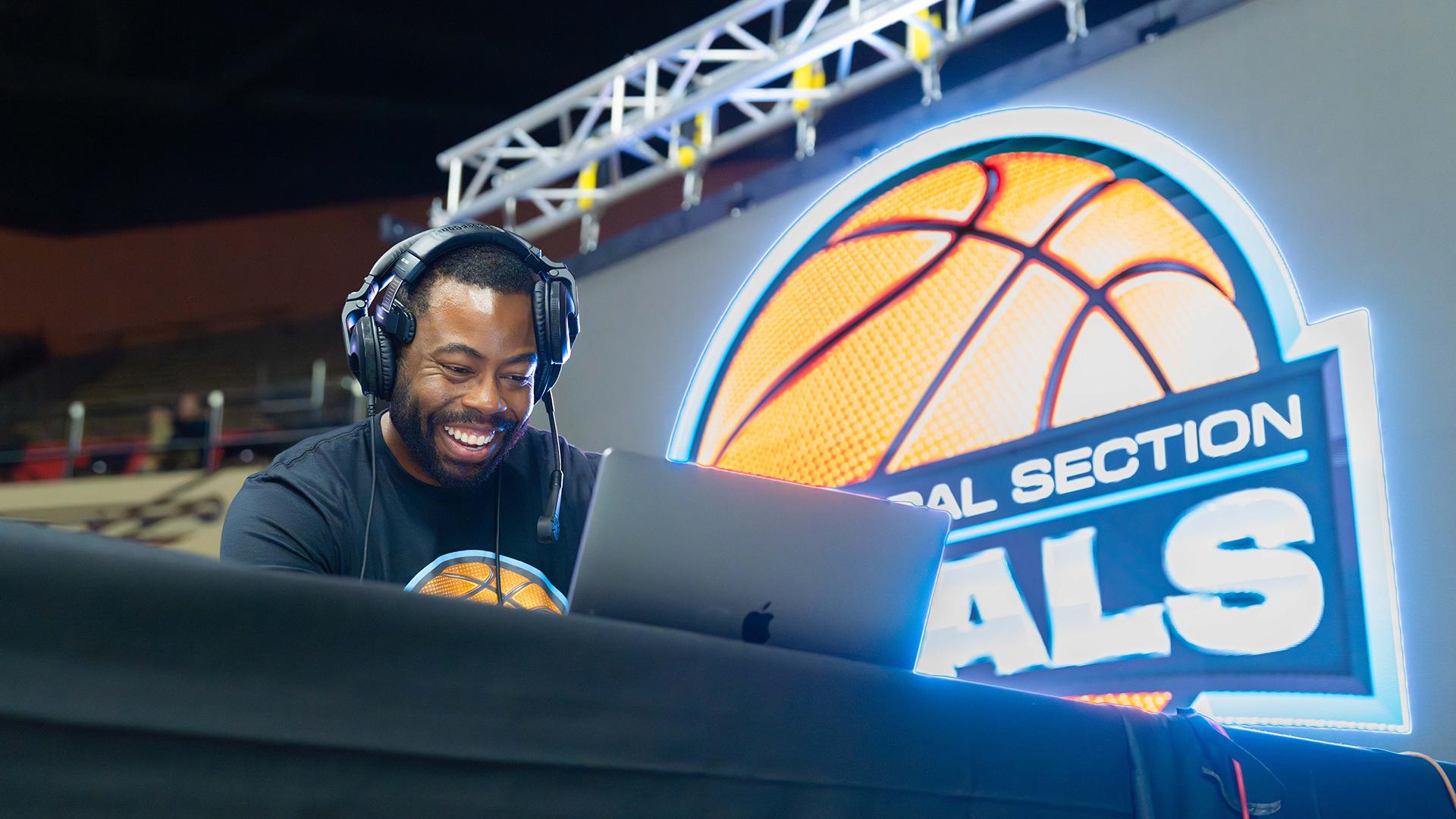 Person is DJing at the event. 