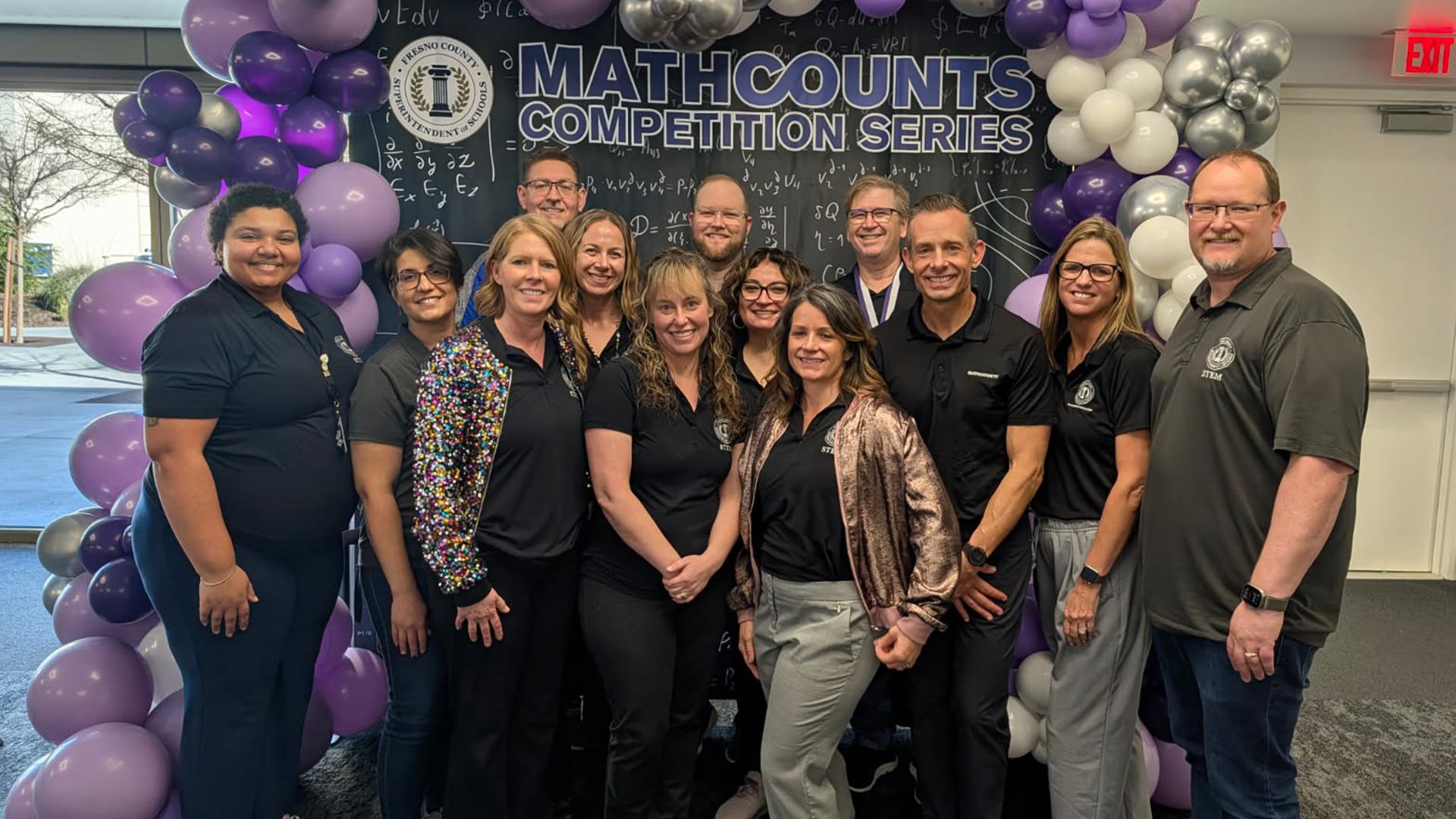 A group of people are standing together. 