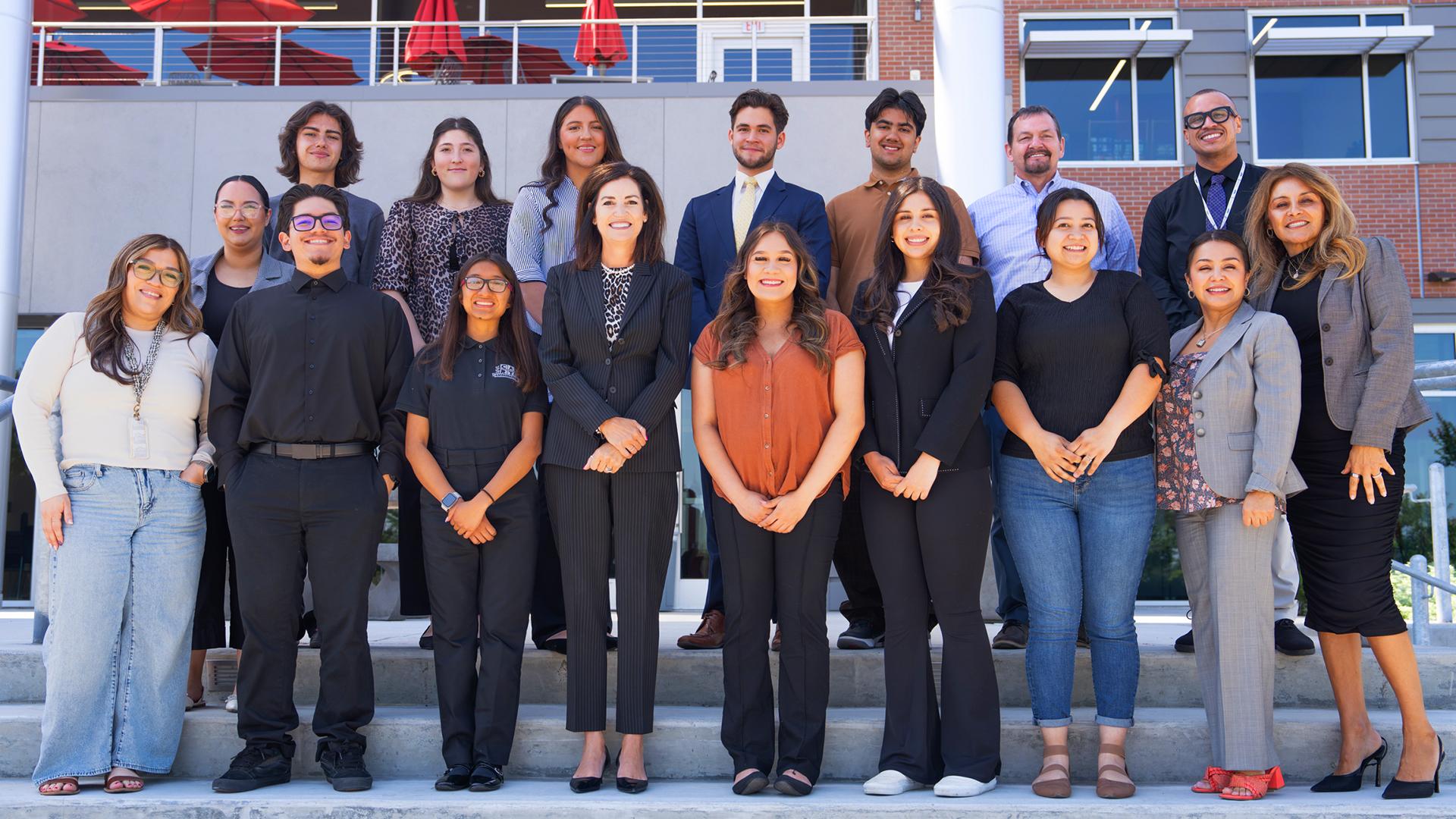 A group of students stand together.