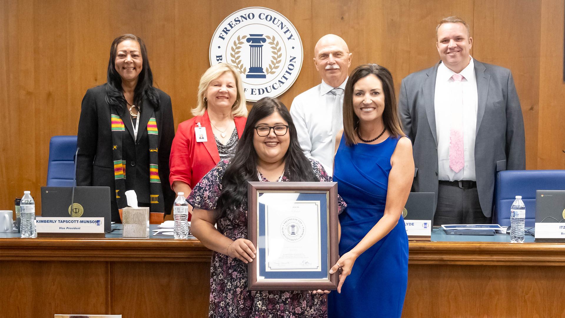 June Employee of the Month with Superintendent and Board