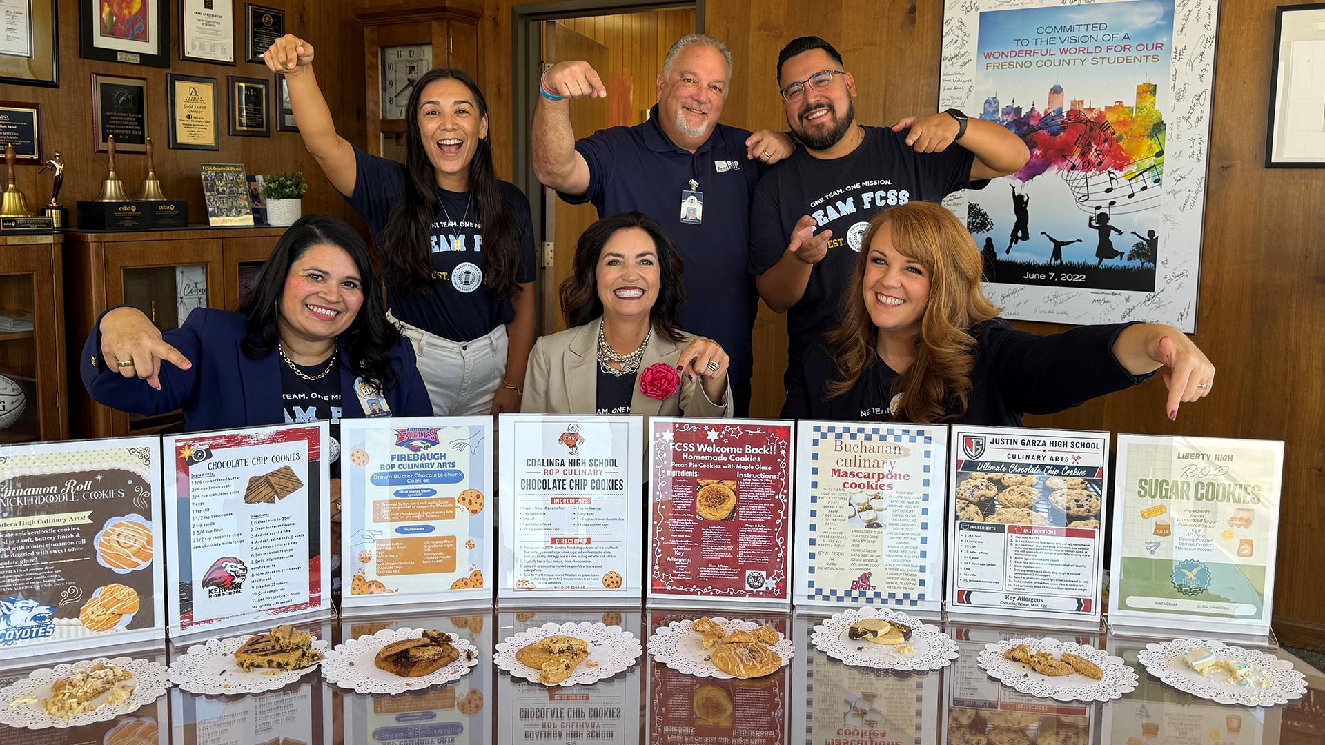FCSS staffers pre-taste the cookies for All Staff Day.