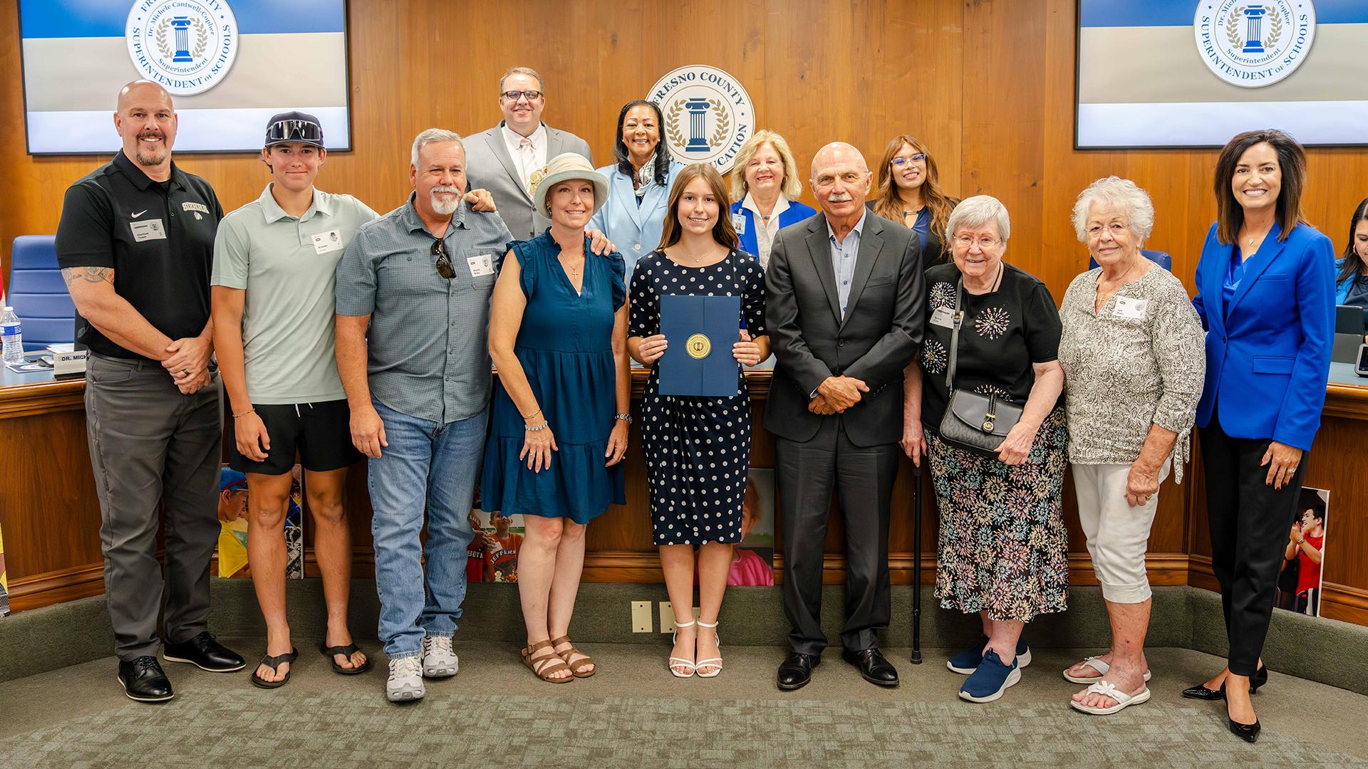 The August Superintendent's Superstar is honored at the monthly board meeting.