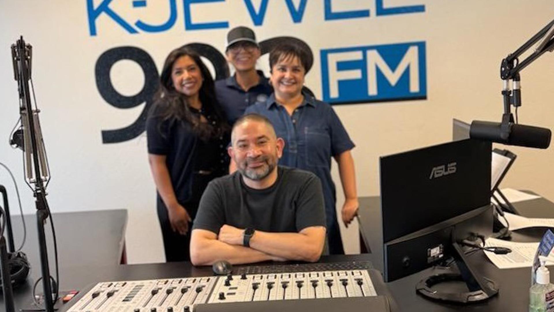 MaryEllen Galvan stops by the K-Jewel radio station with students.